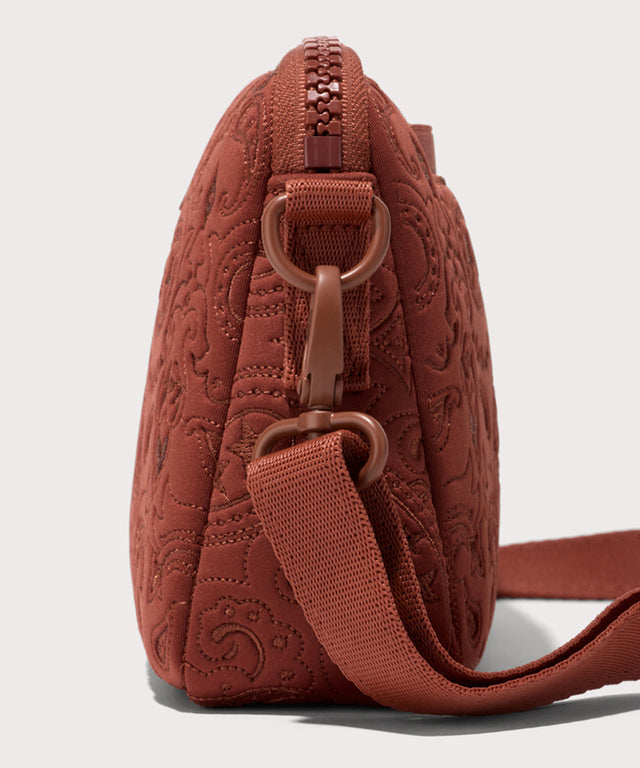 Dagne Dover Nora Shoulder Bag in a rich, warm brown with an embroidered paisley print seen up close, showcasing the pattern.