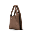 Dagne Dover Dash Grocery Tote in dark brown seen from an angle.
