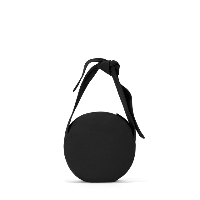 Dagne Dover Luna Shoulder Bag in black with the adjustable shoulder handle shortened.