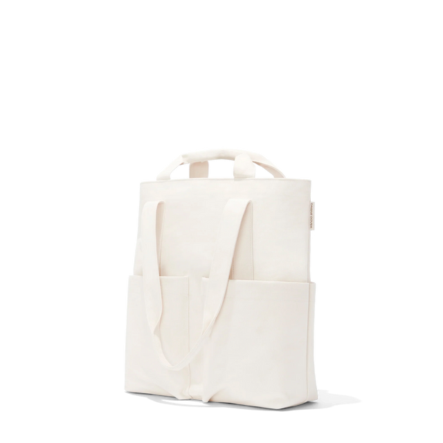 Dagne Dover Pacific Tote in white seen from an angle.