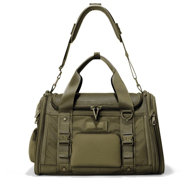 Dagne Dover Large Kyoto Pet Carrier in a deep olive green seen from the front with crossbody strap.