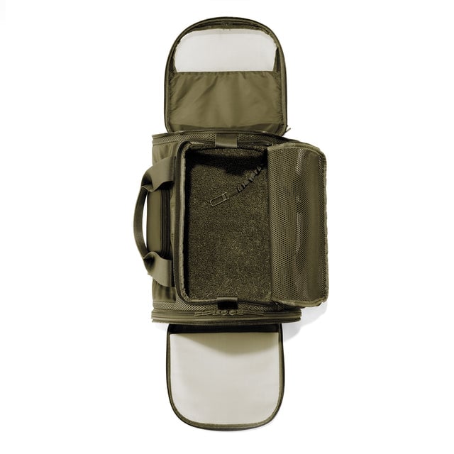 Dagne Dover Large Kyoto Pet Carrier in a deep olive green seen unzipped, top down view. 