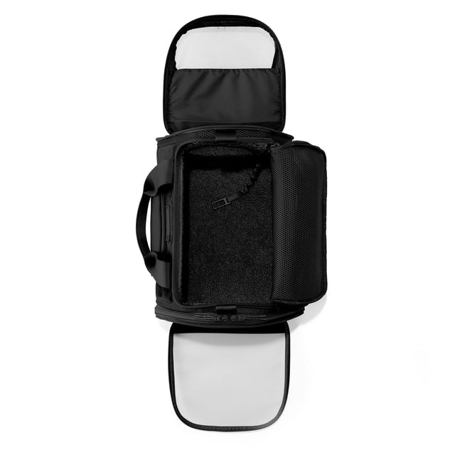 Dagne Dover Large Kyoto Pet Carrier in black seen unzipped, top down view.