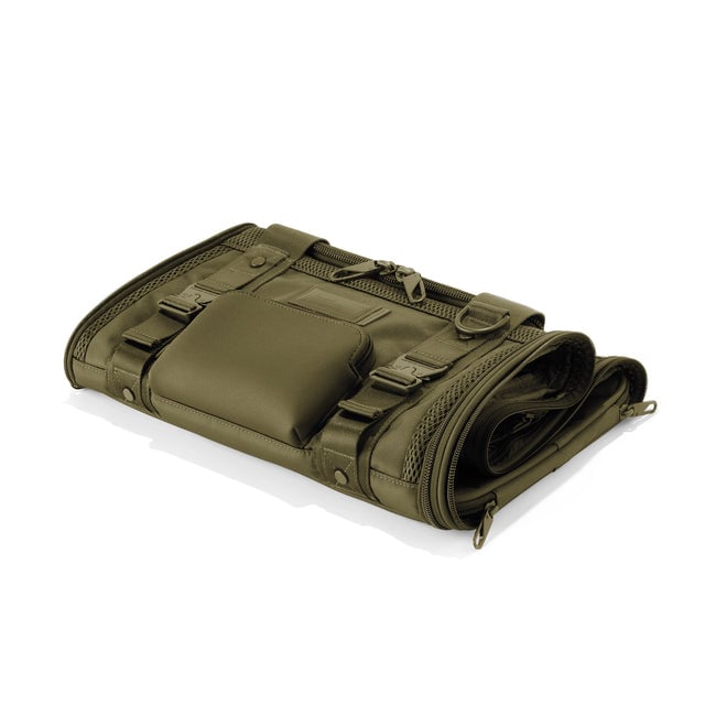 Dagne Dover Small Kyoto Pet Carrier in a deep olive green folded flat.