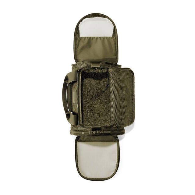 Dagne Dover Small Kyoto Pet Carrier in a deep olive green seen unzipped, top down view.