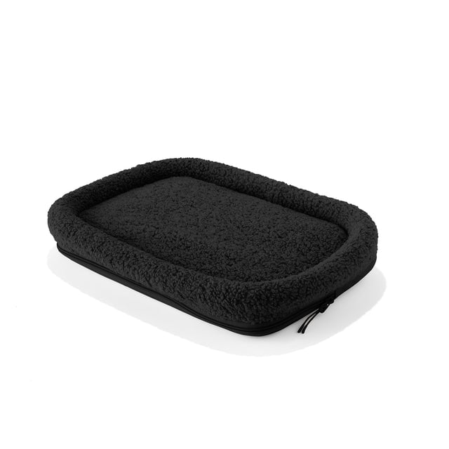 Dagne Dover Small Kyoto Pet Carrier removable padded faux sherpa pet bed in black.