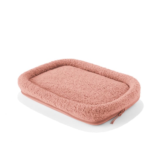 Dagne Dover Small Kyoto Pet Carrier removable padded faux sherpa pet bed in a warm dust pink.