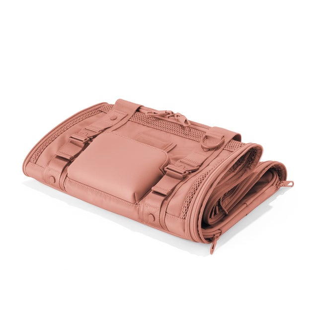 Dagne Dover Small Kyoto Pet Carrier in a warm dust pink folded flat.