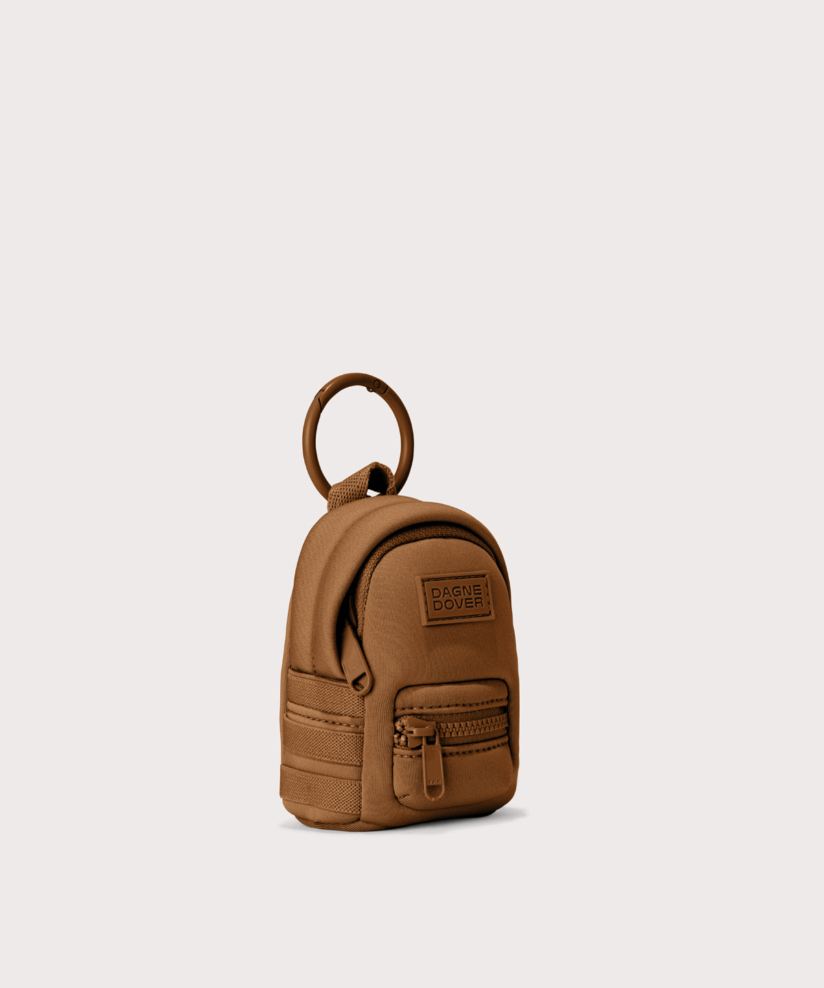 Dakota keychain in a saturated, warm medium-brown with burnt orange undertones, side angle view
