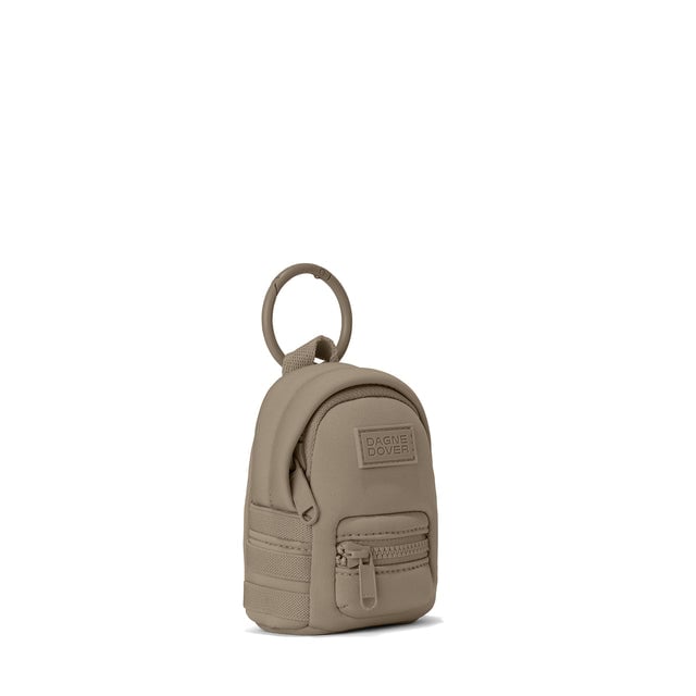 Dagne Dover Dakota Keychain in a medium-dark, creamy tan seen from an angle.