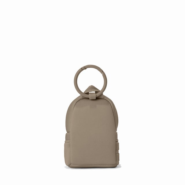 Dagne Dover Dakota Keychain in a medium-dark, creamy tan seen from the back.
