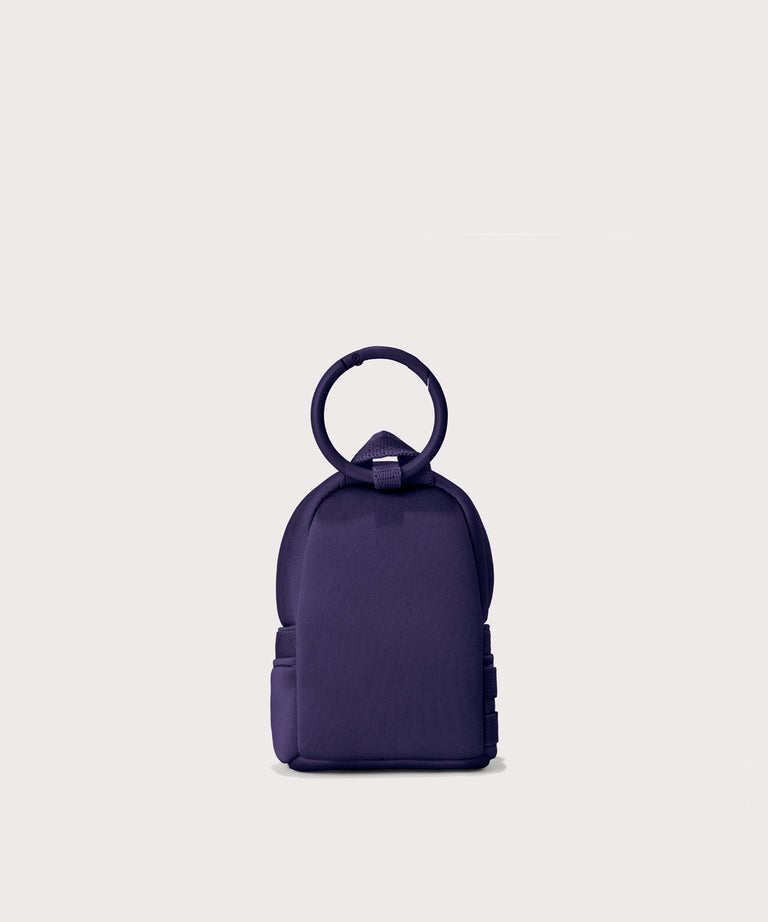 Dakota keychain in a a jewel-toned, deep blue with strong purple undertones. Back view. 
