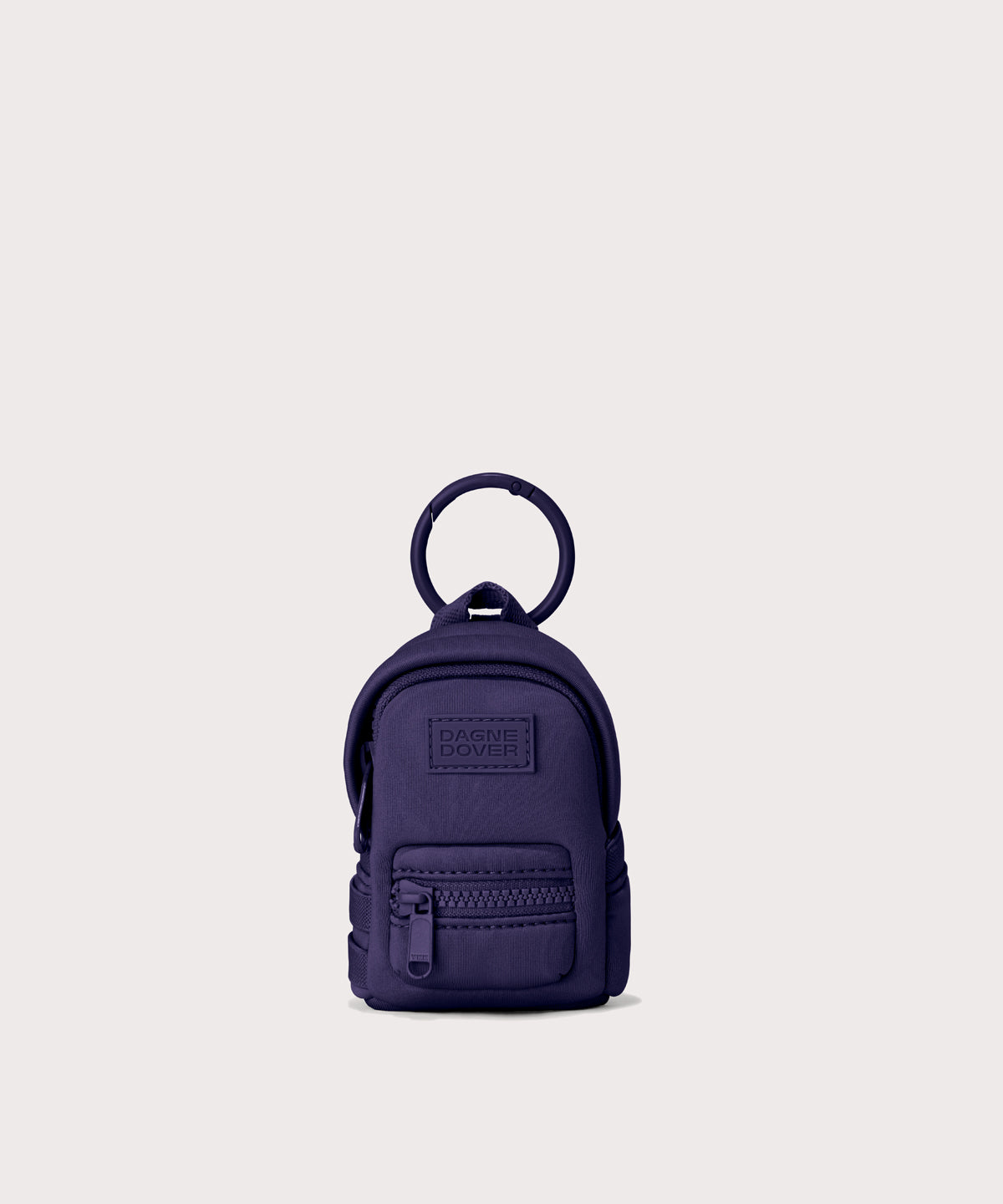 Dakota keychain in a a jewel-toned, deep blue with strong purple undertones.
