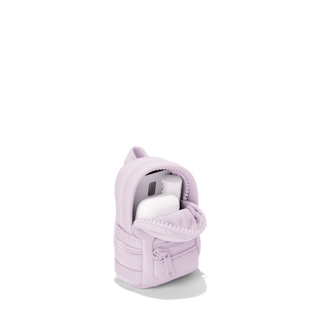 Dagne Dover Dakota Keychain in a soft purple with grey undertones unzipped, showing interior.
