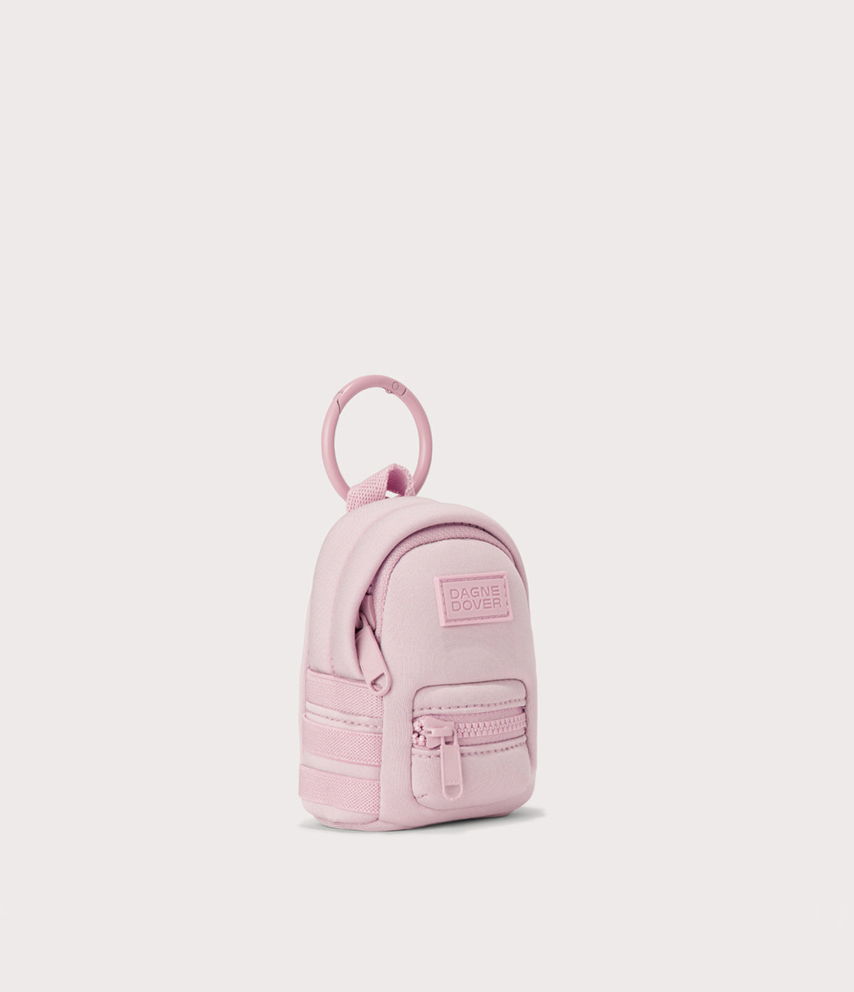 Dakota keychain in a cool, powdery pink with soft grey undertones. side angle view
