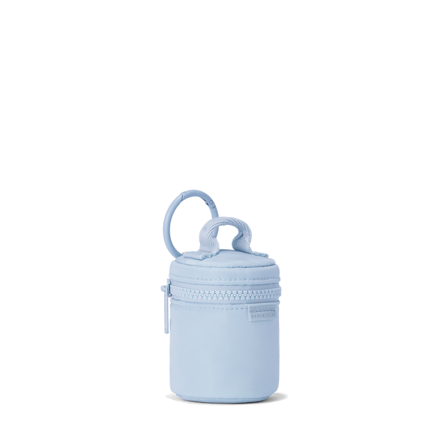 Dagne Dover Mila Keychain in an airy, lighter sky blue seen from an angle.
