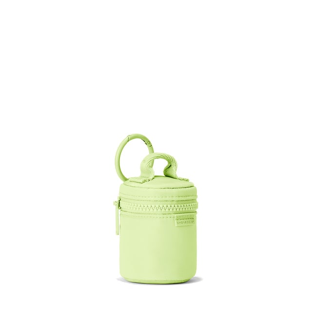 Dagne Dover Mila Keychain in a vibrant, creamy green seen from an angle.