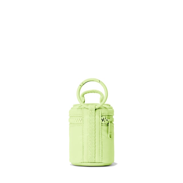 Dagne Dover Mila Keychain in a vibrant, creamy green seen from the back.