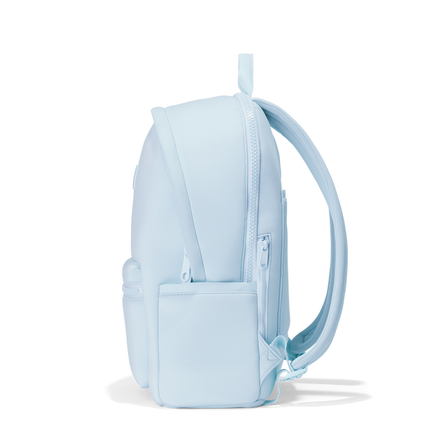 Dagne Dover large Dakota Neoprene Backpack in An airy, lighter sky blue seen from the side.