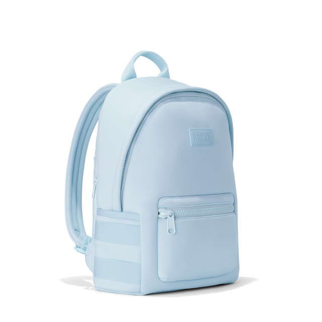 Dagne Dover medium Dakota Neoprene Backpack in an airy, lighter sky blue seen from an angle.
