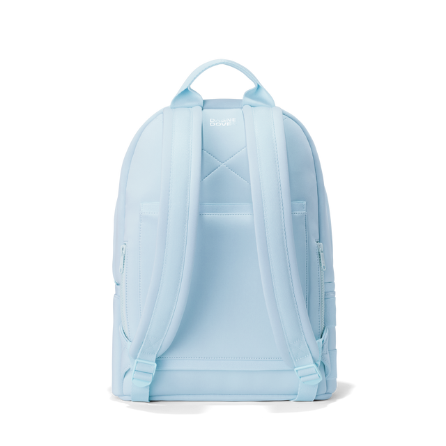 Dagne Dover medium Dakota Neoprene Backpack in an airy, lighter sky blue seen from the back.
