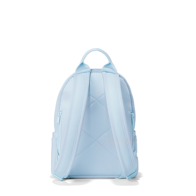 Dagne Dover small Dakota Neoprene Backpack in an airy, lighter sky blue seen from the back.
