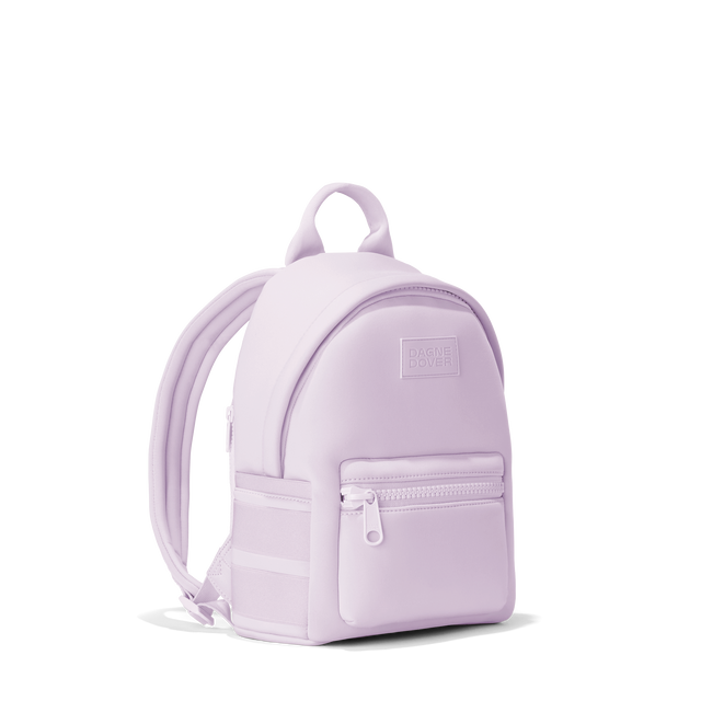 Dagne Dover small Dakota Neoprene Backpack in a soft purple with grey undertones seen from an angle.
