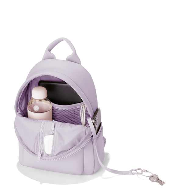 Dagne Dover small Dakota Neoprene Backpack in a soft purple with grey undertones unzipped, showing the interior pockets and shoe bag. hover
