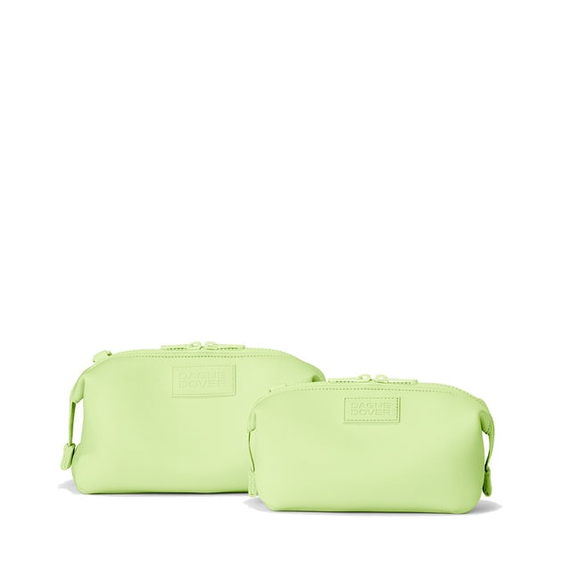 Dagne Dover Small and Large Hunter Toiletry Bags in matcha green.