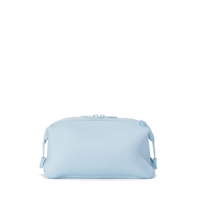 Dagne Dover Large Hunter Toiletry Bag in an airy, lighter sky blue seen from the back.
