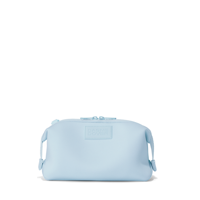 Dagne Dover Large Hunter Toiletry Bag in an airy, lighter sky blue.

