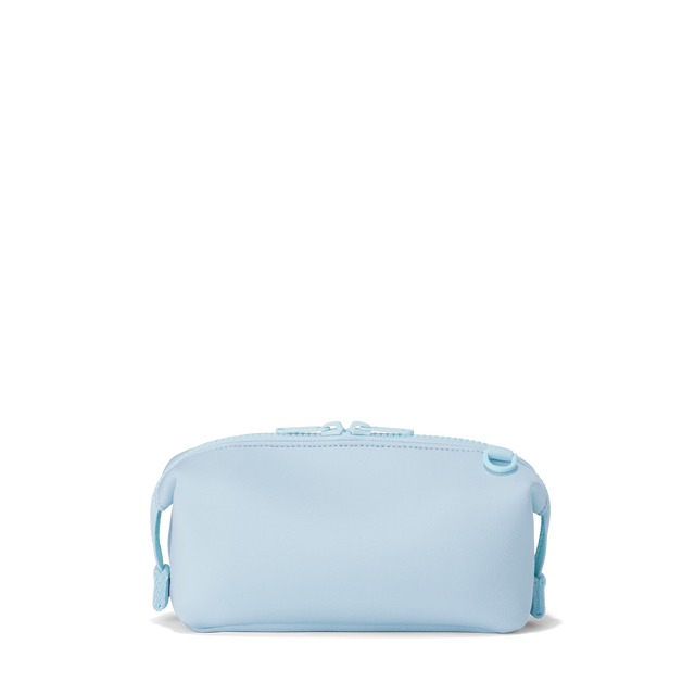 Dagne Dover small Hunter Toiletry Bag in an airy, lighter sky blue seen from the back.

