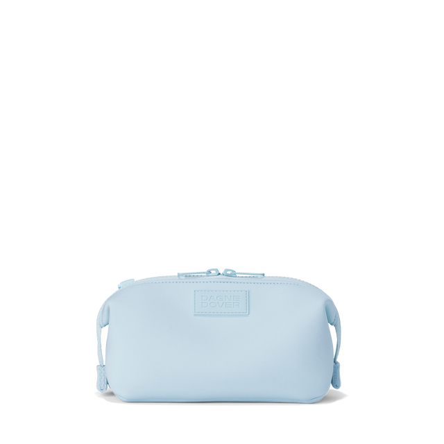 Dagne Dover small Hunter Toiletry Bag in an airy, lighter sky blue.
