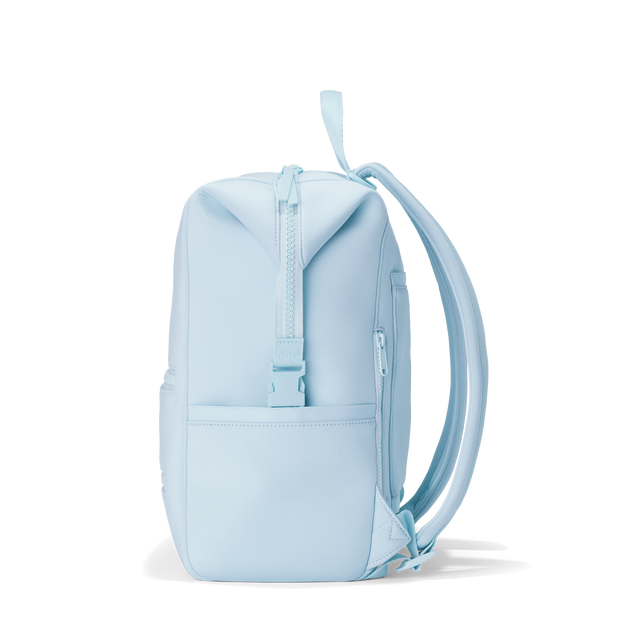 Dagne Dover Large Indi Diaper Backpack in an airy, lighter sky blue seen from the side.
