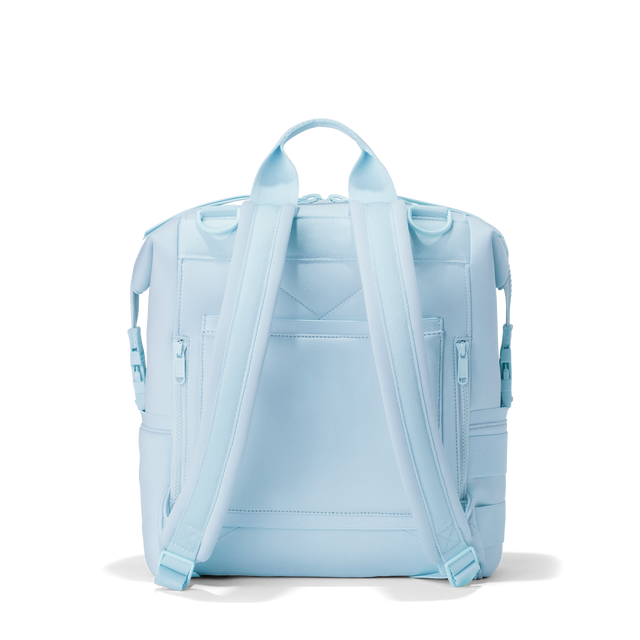 Dagne Dover medium Indi Diaper Backpack in an airy, lighter sky blue seen from the back.

