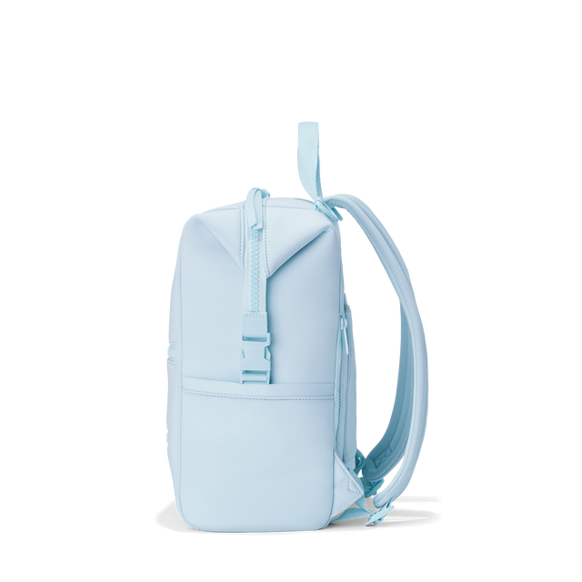 Dagne Dover medium Indi Diaper Backpack in an airy, lighter sky blue seen from the side.
