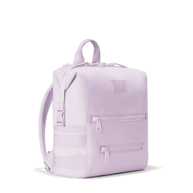 Dagne Dover medium Indi Diaper Backpack in a soft purple with grey undertones seen from an angle.
