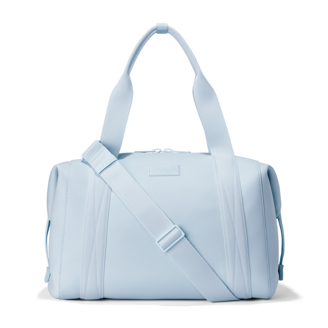 Dagne Dover large Landon Carryall in an airy, lighter sky blue. 
