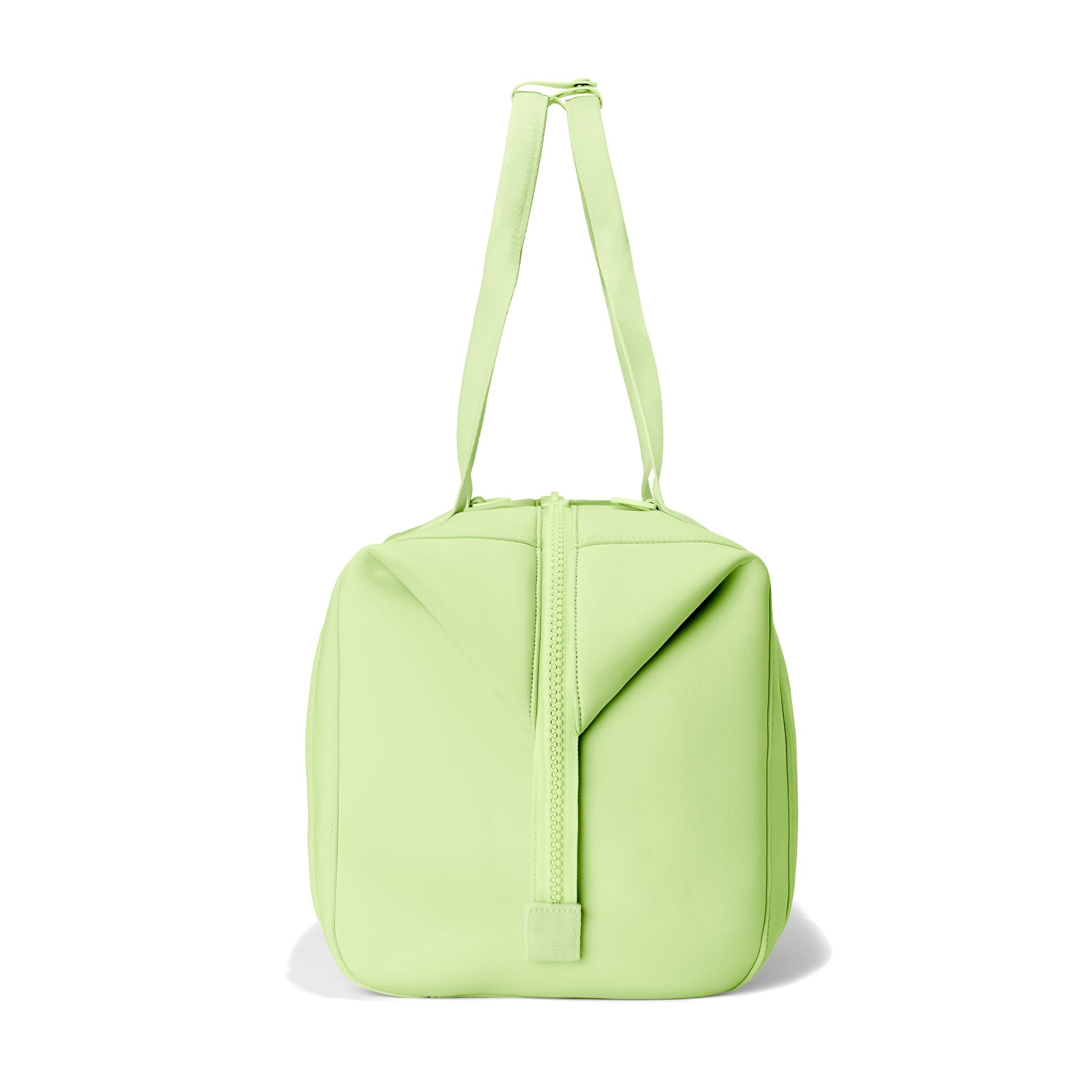 Dagne Dover Large Landon Carryall in a vibrant, creamy green, seen from the side.