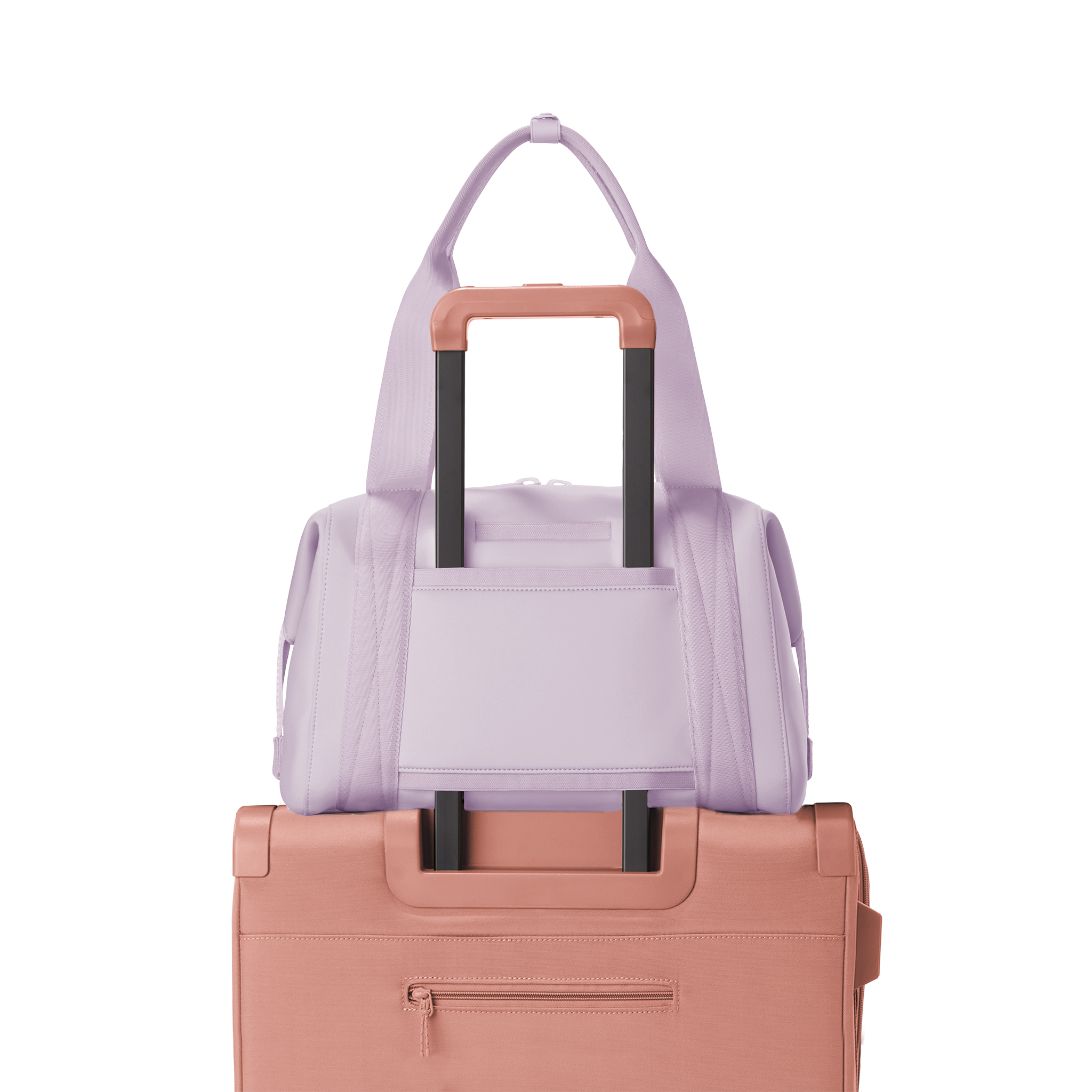 Dagne Dover medium Landon Carryall in a soft purple with grey undertones displaying luggage sleeve.
