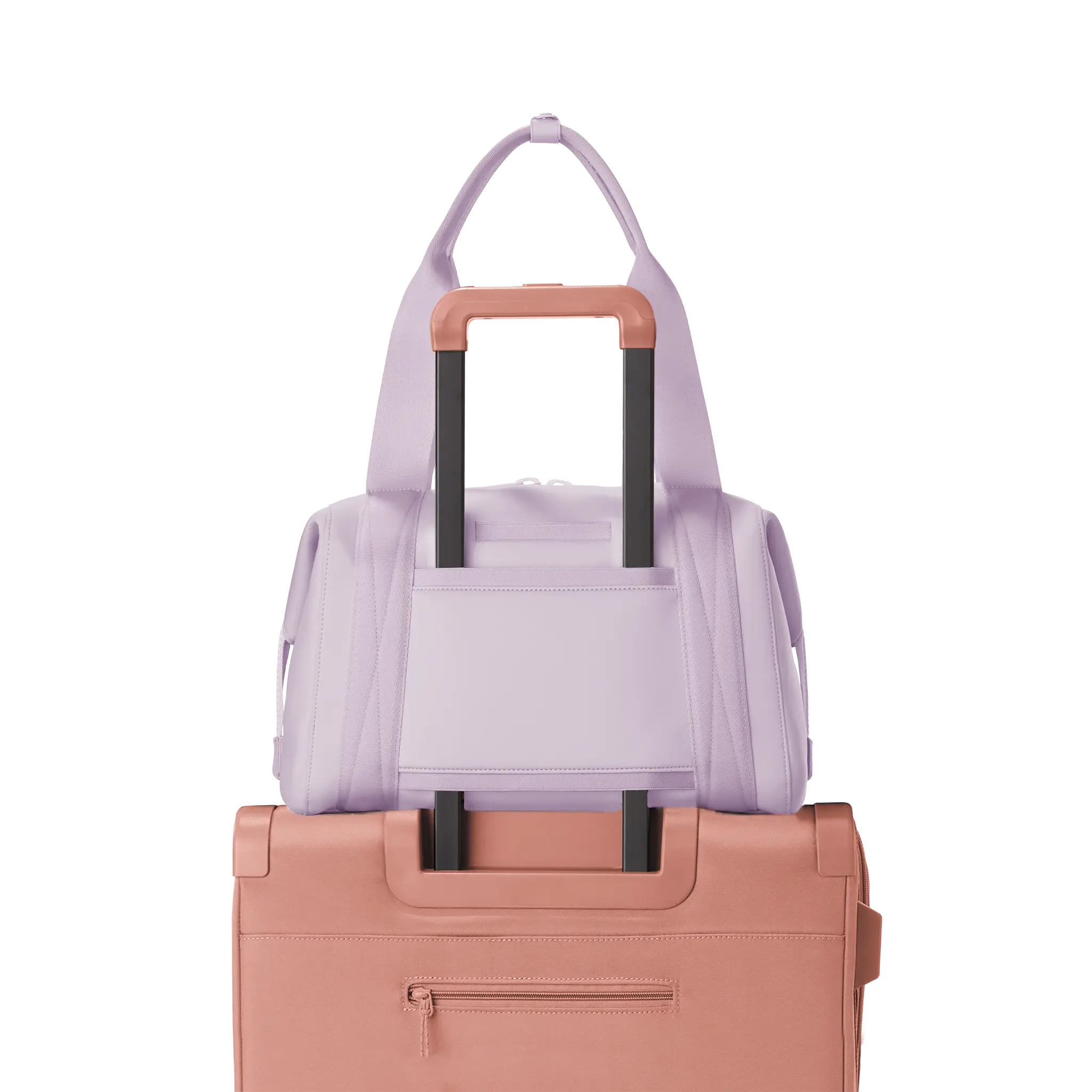 Dagne Dover medium Landon Carryall in a soft purple with grey undertones displaying luggage sleeve.
