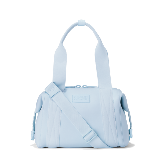 Dagne Dover small Landon Carryall in an airy, lighter sky blue. 
