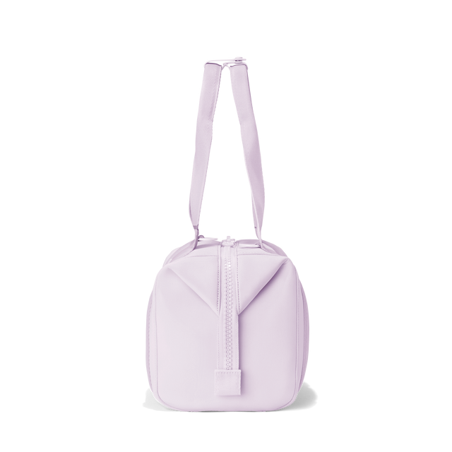 Dagne Dover small Landon Carryall in a soft purple with grey undertones seen from the side.
