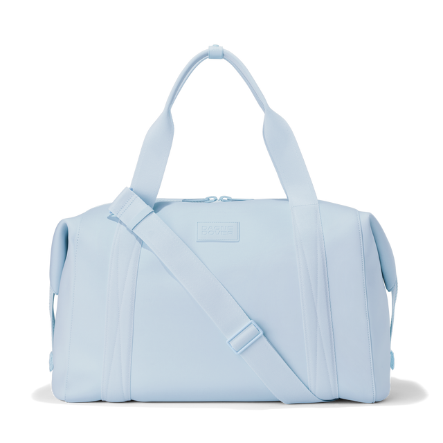 Dagne Dover extra large Landon Carryall in an airy, lighter sky blue. 
