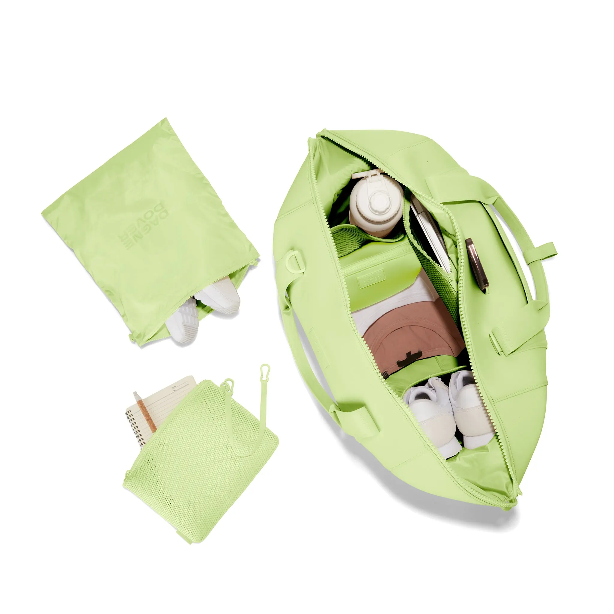 Dagne Dover Extra Large Landon Carryall in a vibrant, creamy green unzipped, top down view. hover