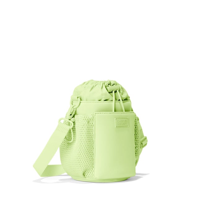 Dagne Dover Sloan Water Bottle Sling in a vibrant, creamy green seen from an angle.