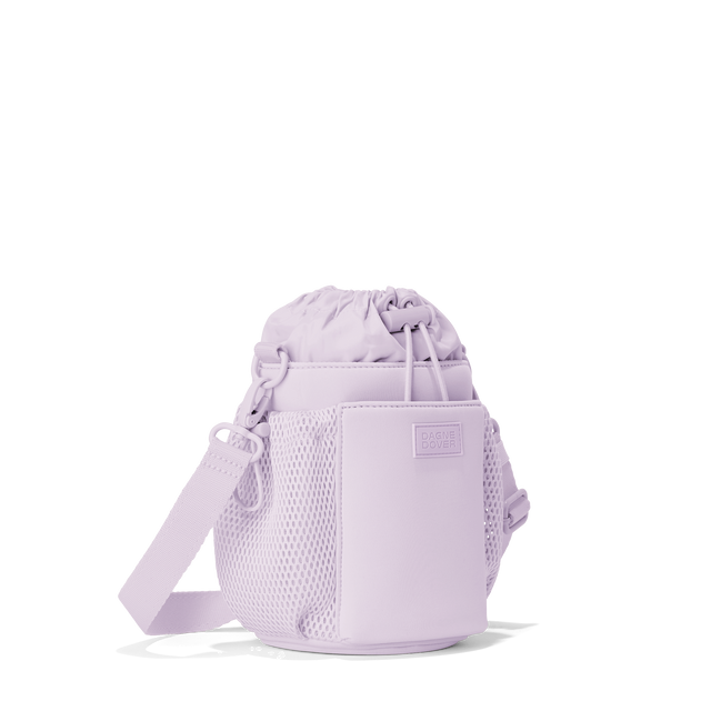 Dagne Dover Sloan Water Bottle Sling in a soft purple with grey undertones seen from an angle.
