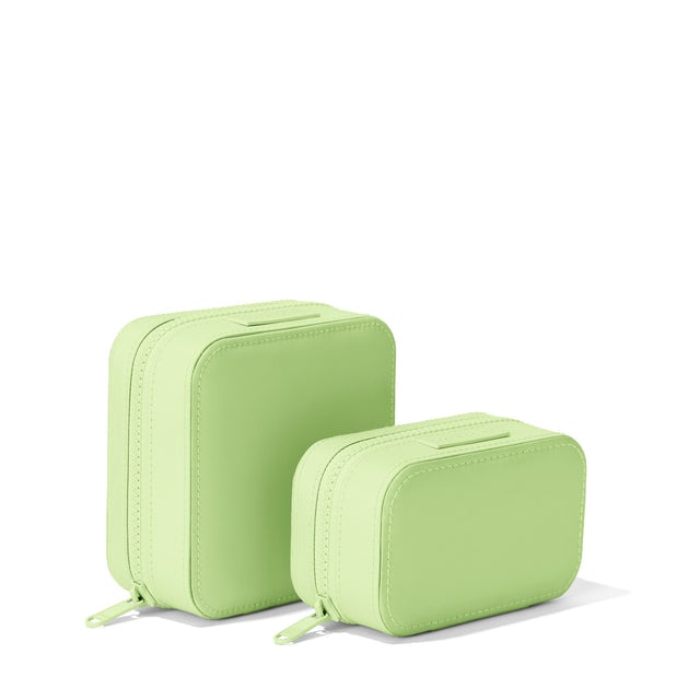 Dagne Dover Small and Large Frankie Jewelry Cases in a matcha green standing next to one another.