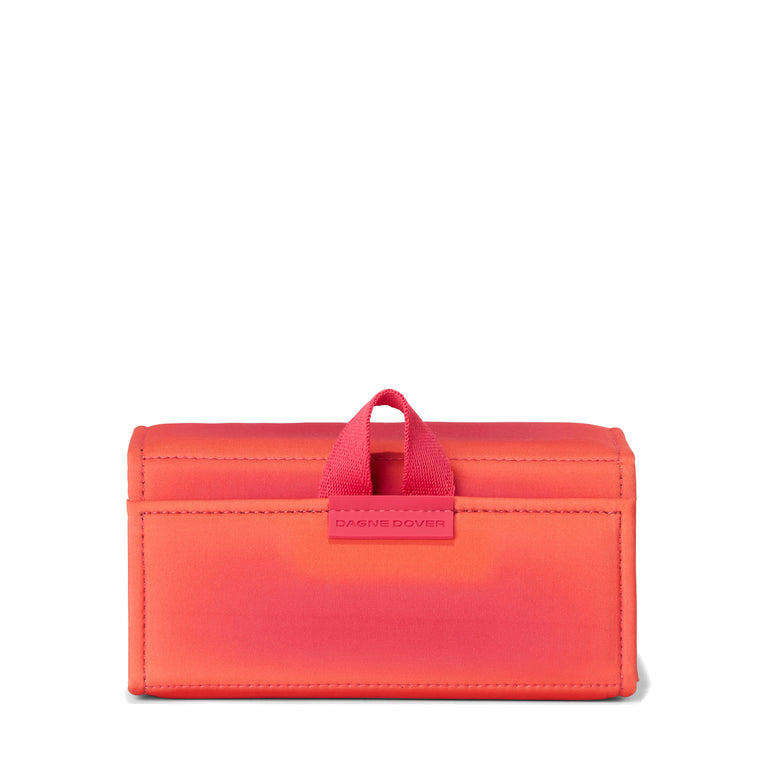 Dagne Dover Remi foldable glasses holder in a sun-bleached novelty treatment with fruit punch and pops of airbrushed orange.