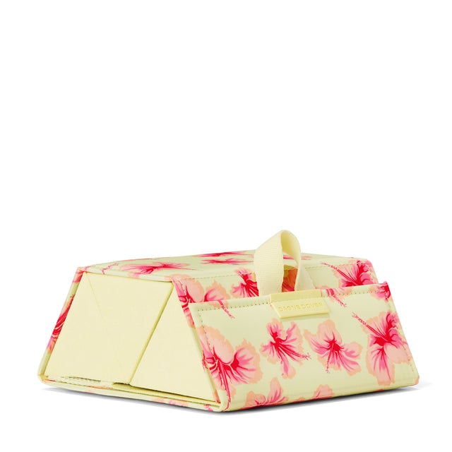 Dagne Dover Remi foldable glasses holder in dark a custom-painted hibiscus pattern seen from an angle.